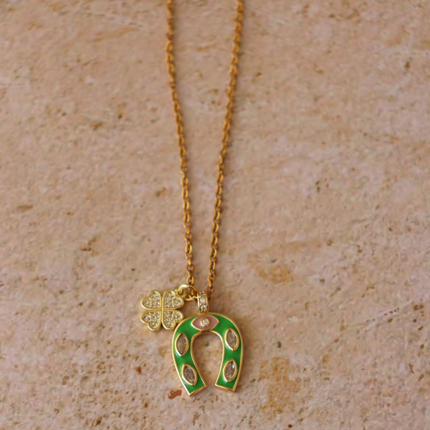 Lucky Girl Necklace — gold chain with green enamel horseshoe and clover charm